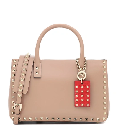 Shop Valentino Rockstud Small Leather Tote In Beige