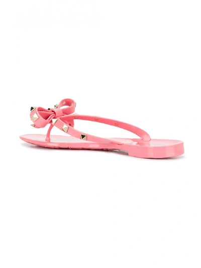Shop Valentino Rockstud Flip Flops In Pink