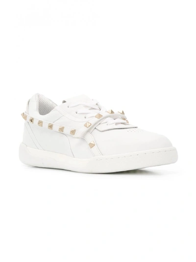 Shop Valentino Rockstud Armor Leather Sneakers In White