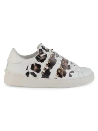 Shop Valentino Rockstud Leopard Leather Sneakers In Bianco