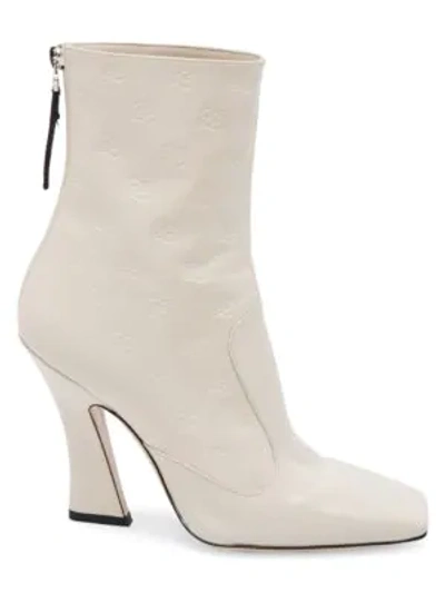 Shop Fendi Karligraphy Embossed Leather Ankle Boots In Bianco