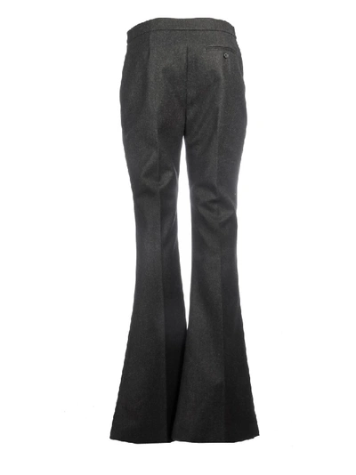 Shop Alexander Mcqueen Wool Flared Trousers In Black