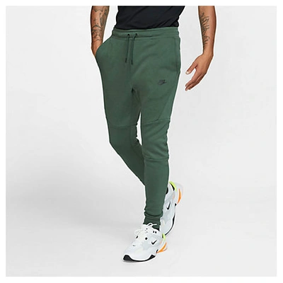 Shop Nike Tech Fleece Jogger Pants In Green