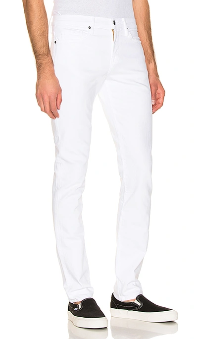 Shop Frame Slim Jeans In White