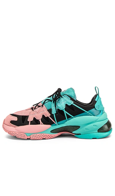 Shop Puma Lqd Cell Omega In Pink & Teal
