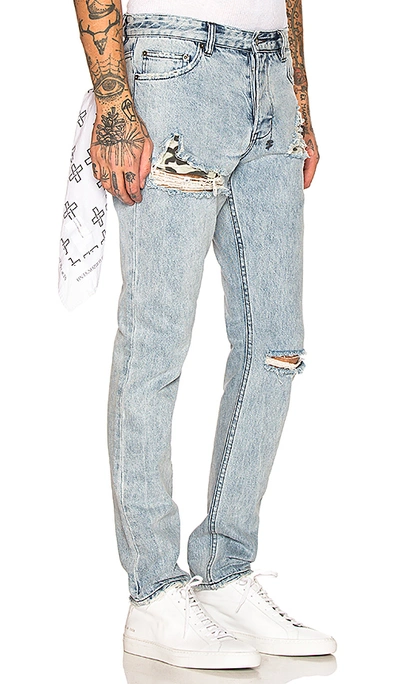 CHITCH EXPOSED CAMO 牛仔裤