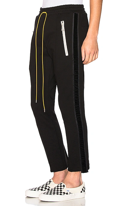 Shop Rhude Pin Strip Pants In Black
