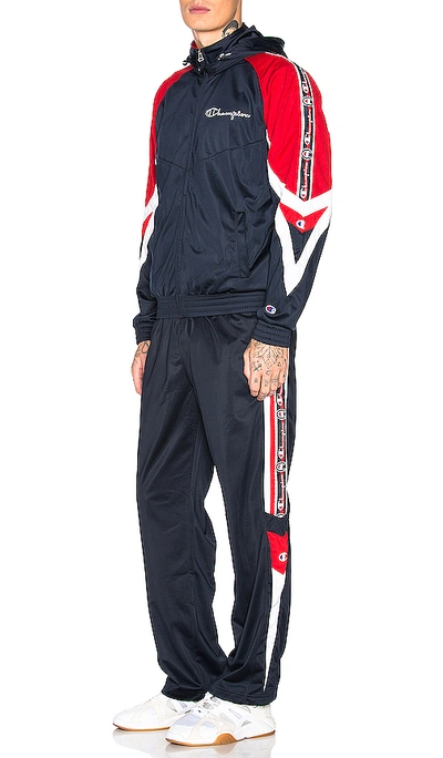 Shop Champion Track Pants In Navy