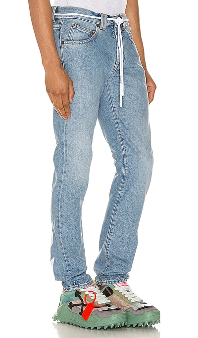 Shop Off-white Diagonal Stripe Slim Jeans In Bleach White