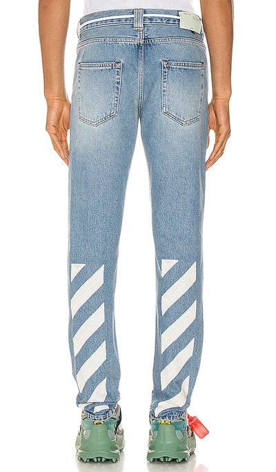 Shop Off-white Diagonal Stripe Slim Jeans In Bleach White