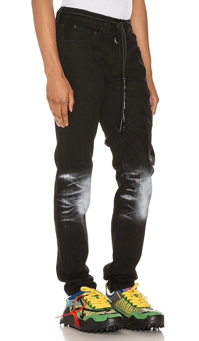 Shop Off-white Slim Asymmetric Jeans In Black