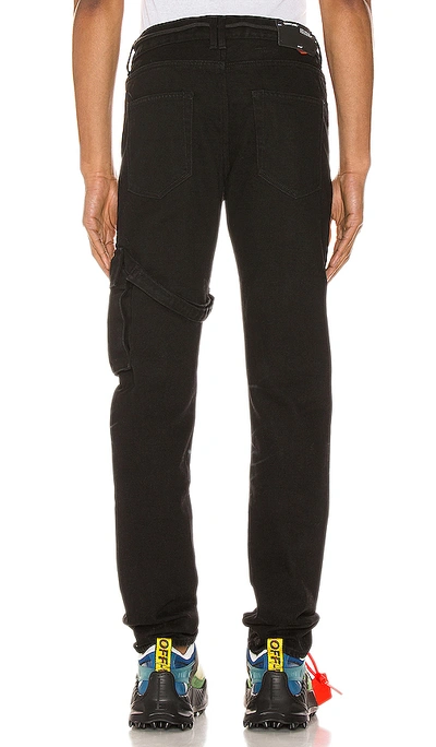 Shop Off-white Slim Asymmetric Jeans In Black