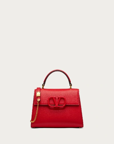 Shop Valentino Garavani Small Vsling Grainy Calfskin Handbag In Pure Red/poudre