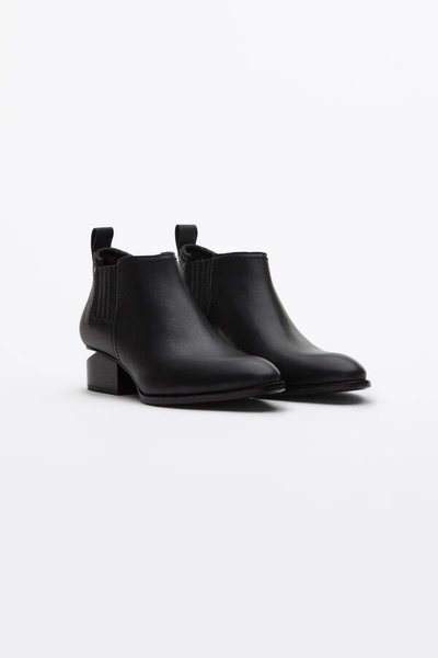 Shop Alexander Wang Kori Bootie With Rose Gold In Black