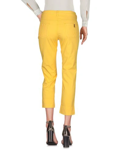 Shop Atelier Notify Casual Pants In Yellow