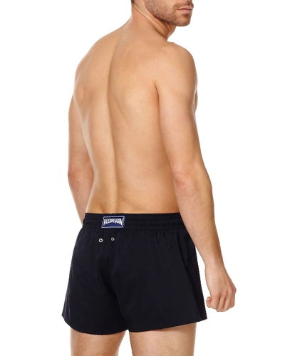 Shop Vilebrequin Men's Unis Stretch-solid Swim Trunks In Noir