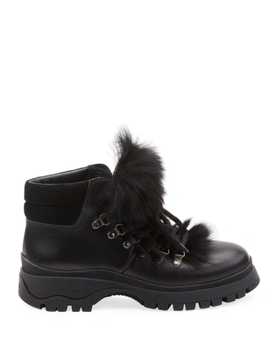 Shop Prada Lug-sole Hiker Boots With Fur Trim In Black