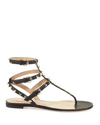 Shop Valentino Rockstud Flat Thong Sandals, Black