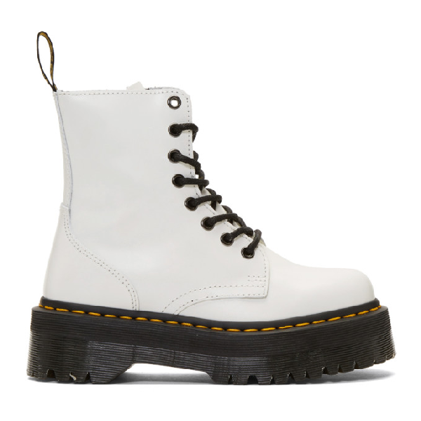 boots with yellow logo on sole