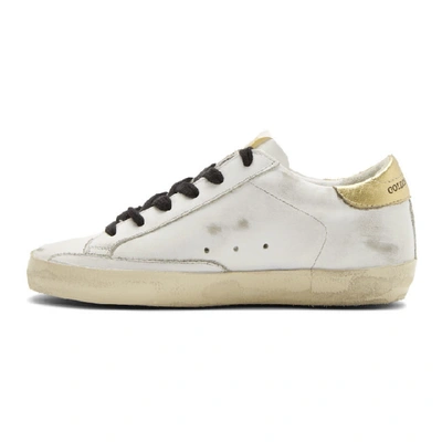 Shop Golden Goose White Gold Tab Super Star Sneakers