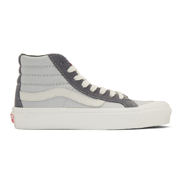 gray and white high top vans