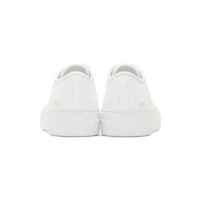 Shop Common Projects White Tournament Low Super Sneakers In 0506 White