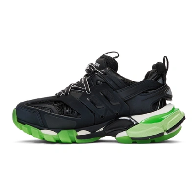 Shop Balenciaga Black And Green Glow Track Sneakers In 1003 Blk/gl