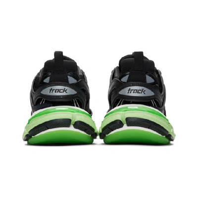 Shop Balenciaga Black And Green Glow Track Sneakers In 1003 Blk/gl