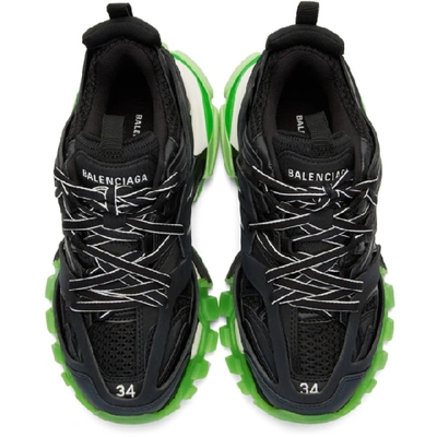 Shop Balenciaga Black And Green Glow Track Sneakers In 1003 Blk/gl