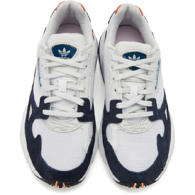 Shop Adidas Originals White And Navy Falcon Sneakers In Wht/navy