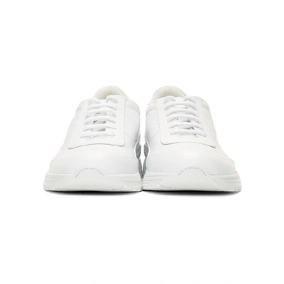 Shop Common Projects White Cross Trainer Sneakers In 0506 White