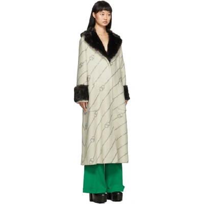 Shop Gucci Off-white Faux-fur Collar Crystal Gg Coat In 9705 Ivory