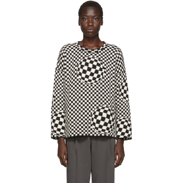 black and white checkered sweater