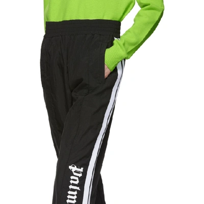 Shop Palm Angels Black Logo Over Track Pants In Black/white