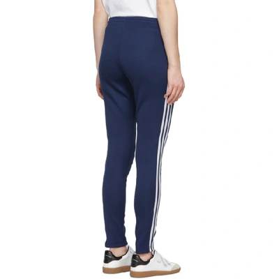 Shop Adidas Originals Blue Sst Track Pants In Dark Blue