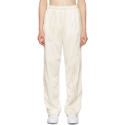 Shop Adidas Originals By Danielle Cathari White Firebird Track Pants In 077a Chlkwh