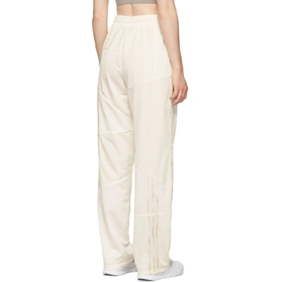 Shop Adidas Originals By Danielle Cathari White Firebird Track Pants In 077a Chlkwh