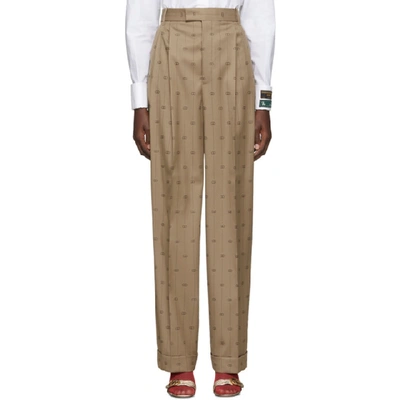 Shop Gucci Beige Pinstripe Gg Trousers In 9702 Beige