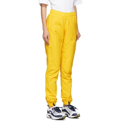 Shop Reebok Classics Yellow Vector Track Pants
