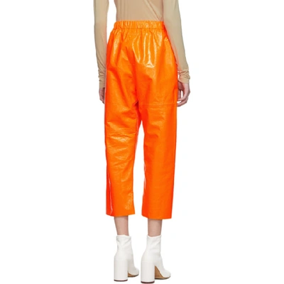 Shop Mm6 Maison Margiela Orange Crust Foil Leather Pants In 914 Orangef