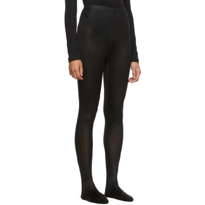 Shop Versace Black Shiny Stretch Leggings In A1008 Black