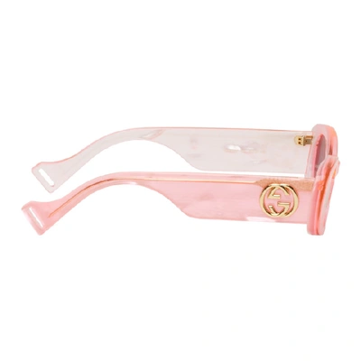 Shop Gucci Pink Oval Sunglasses In 652 Pink