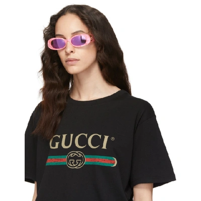 Shop Gucci Pink Oval Sunglasses In 652 Pink