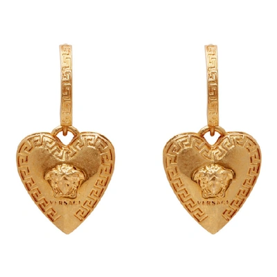 Shop Versace Gold Love Medusa Earrings In Kot Gold