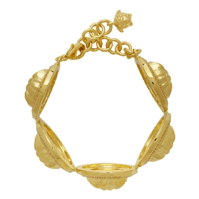 Shop Versace Gold Oversized Coins Bracelet In D00h Gold