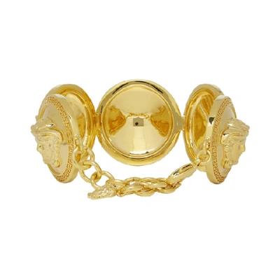 Shop Versace Gold Oversized Coins Bracelet In D00h Gold