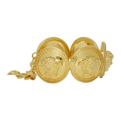 Shop Versace Gold Oversized Coins Bracelet In D00h Gold