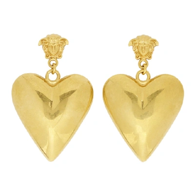 Shop Versace Gold Medusa Heart Pendant Earrings