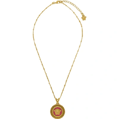 Shop Versace Pink And Gold Medusa Pendant Necklace In D50ot Pink