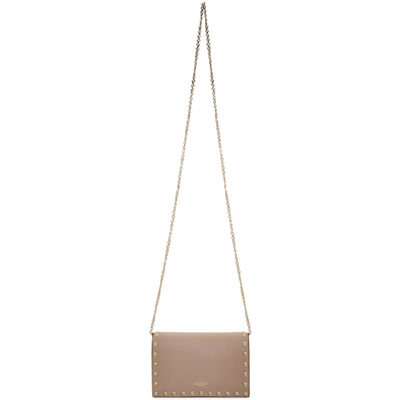 Shop Valentino Pink  Garavani Rockstud Wallet Chain Bag In P45 Poudre